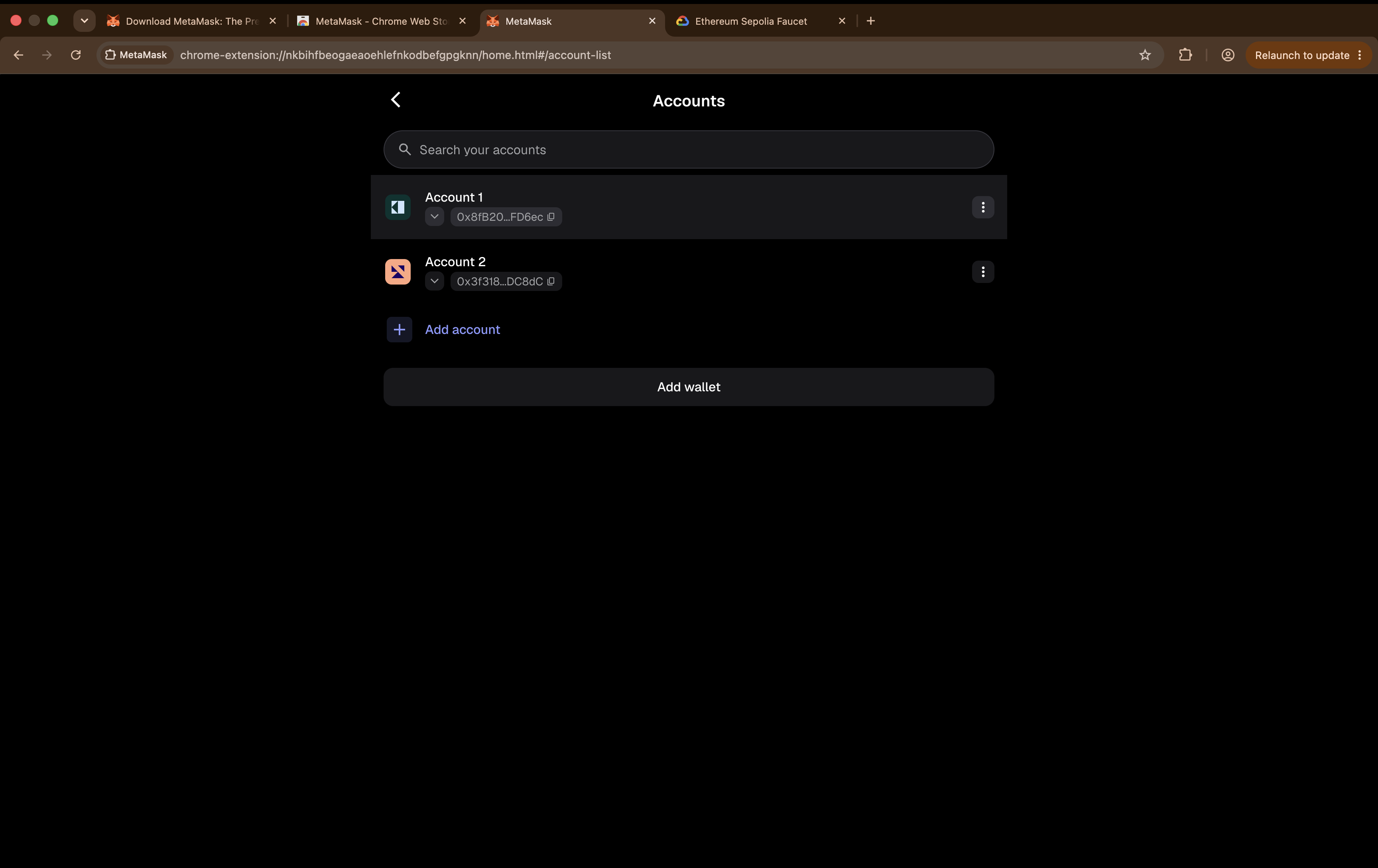 The MetaMask account list showing two accounts belonging to the same wallet.